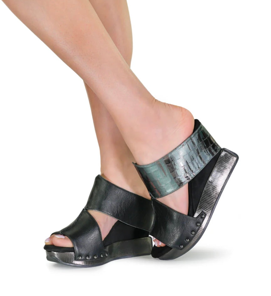 Black wedge sandals with alligator-like leather model