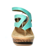 Wedge sandal with turquoise straps front view