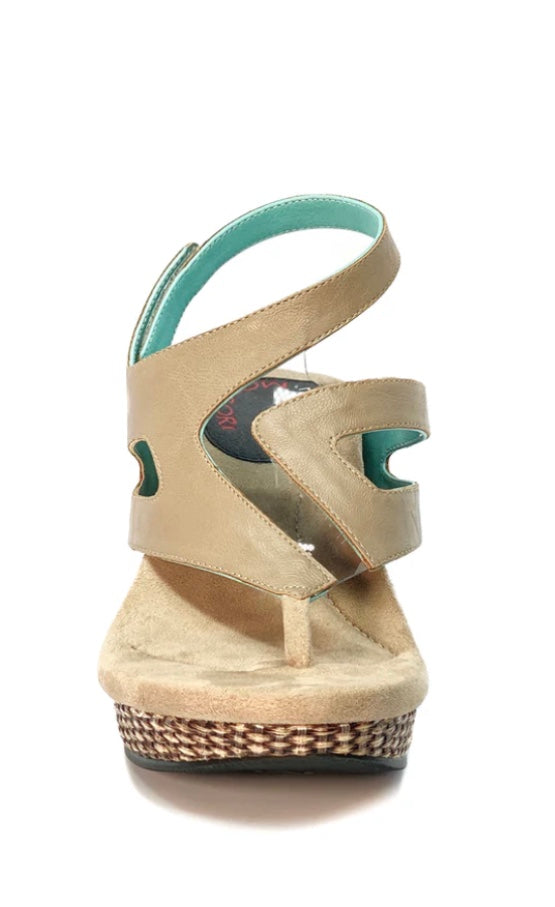 Wedge sandal with beige straps front view