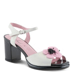 Open toe heeled shoe with white strap, black sole, and pink flower front view