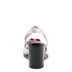 Open toe heeled shoe with white strap, black sole, and pink flower heel view
