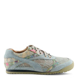 Light blue sneaker with floral pattern close-up