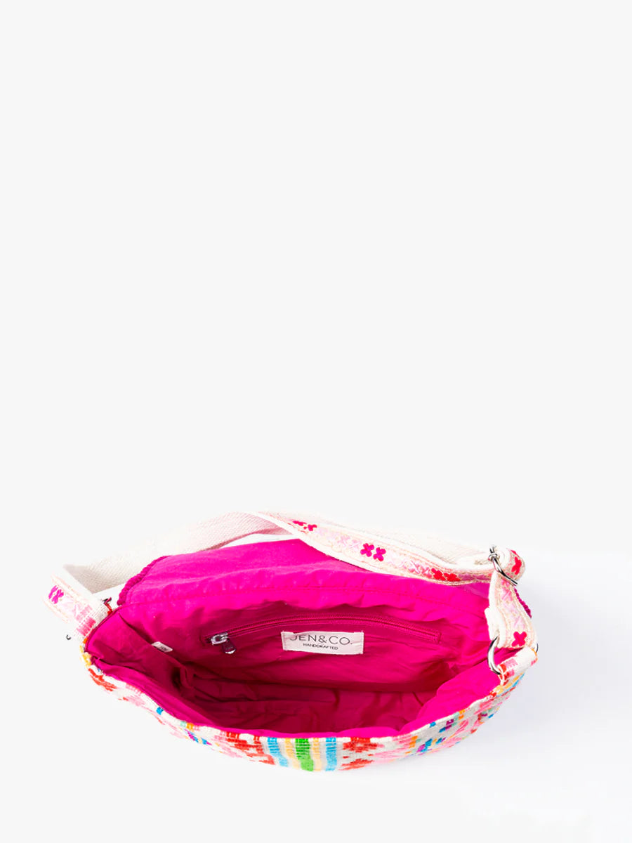 Colorful patterned crossbody bag with tassels opening