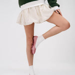 Pink woven jelly flat model pose