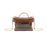Brown handbag with clear front section and gold chain strap on a white background