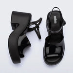 Black platform heels with black strap & buckle closure top& side view