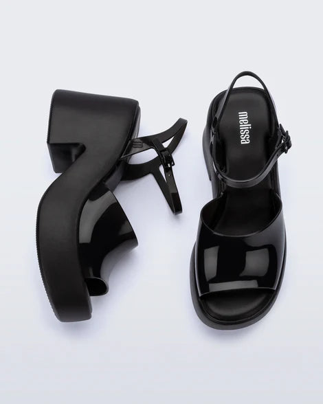 Black platform heels with black strap & buckle closure top& side view