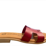 Red sandal with beige sole close-up