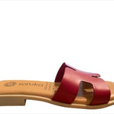 Red sandal with beige sole close-up