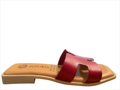 Red sandal with beige sole close-up