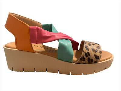 Colorful pink and green strap wedge with leopard print toe strap close-up