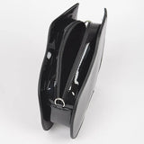 Black grand piano handbag with black strap opening