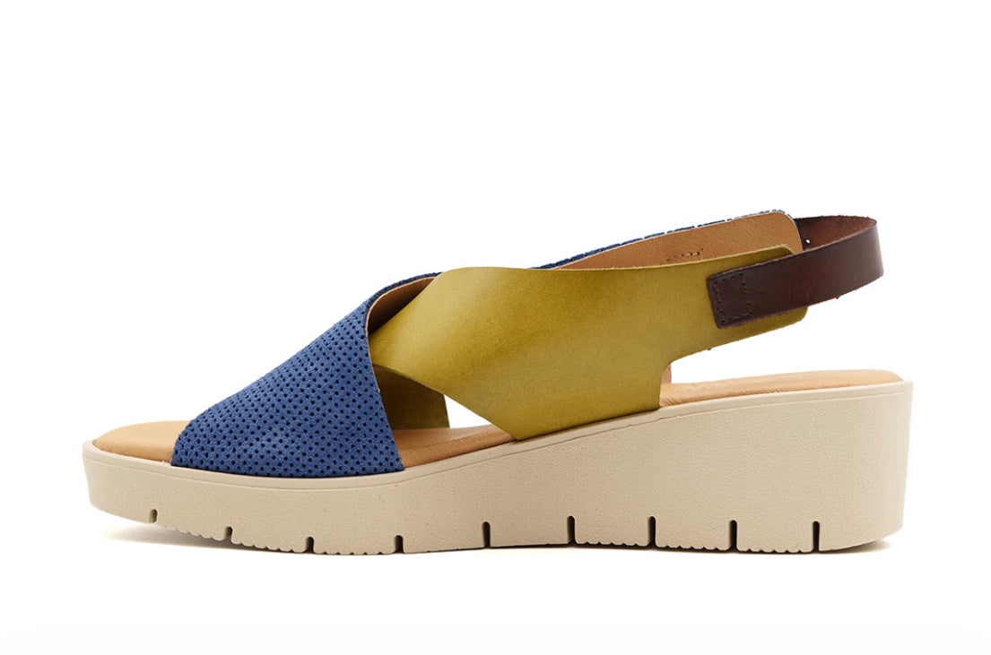 Blue and green wedge with a beige sole, brown heel strap and buckle closure inner side view