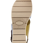 Blue and green wedge with a beige sole, brown heel strap and buckle closure bottom view