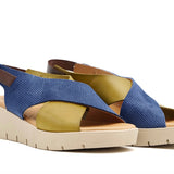 Blue and green wedge with a beige sole, brown heel strap and buckle closure pair