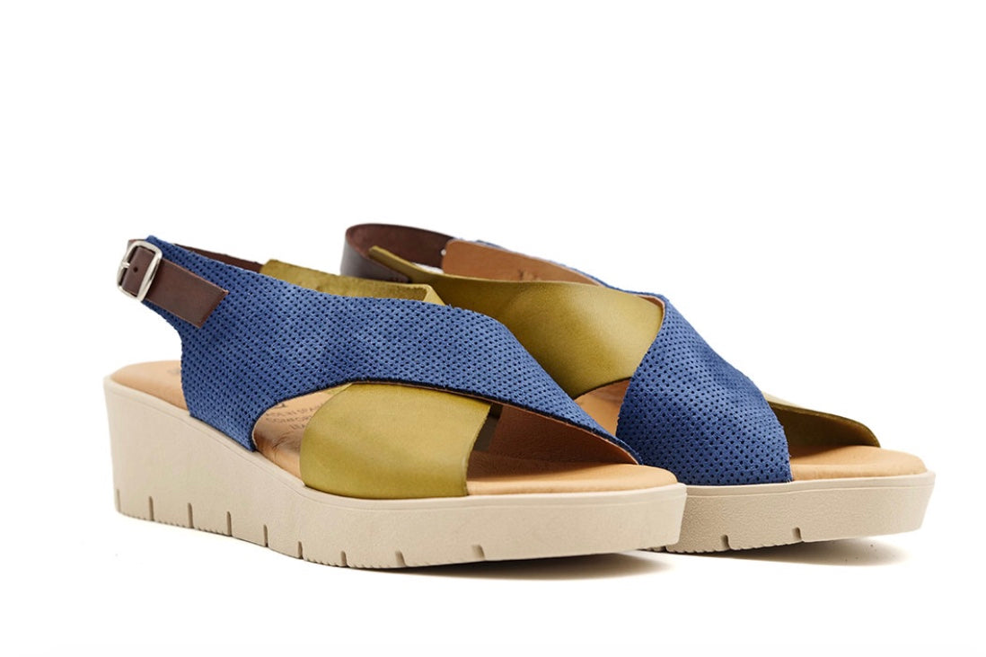 Blue and green wedge with a beige sole, brown heel strap and buckle closure pair