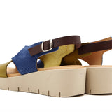 Blue and green wedge with a beige sole, brown heel strap and buckle closure pair heel view