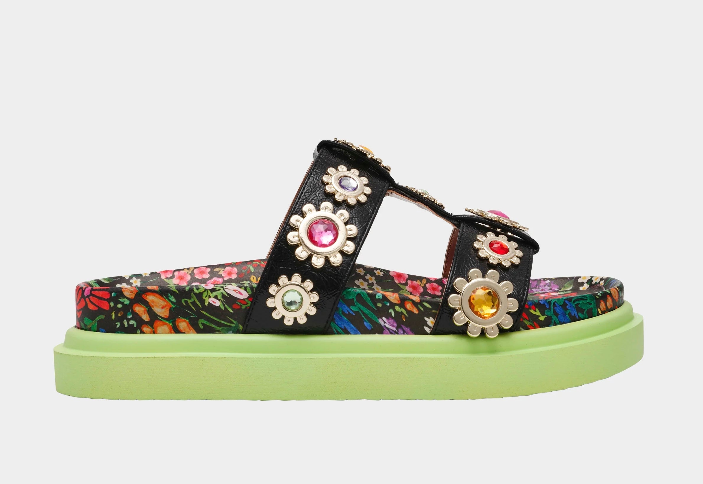 Floral sandal with colorful jewel embellishments and green heel close-up