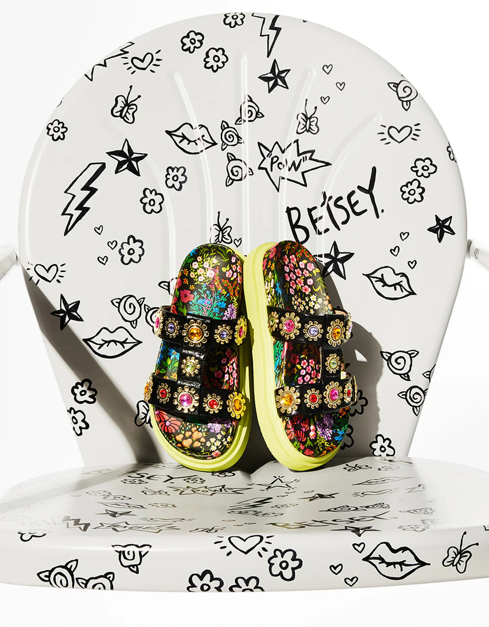 Floral sandal with colorful jewel embellishments and green heel overhead