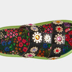 Floral sandal with colorful jewel embellishments and green heel top view