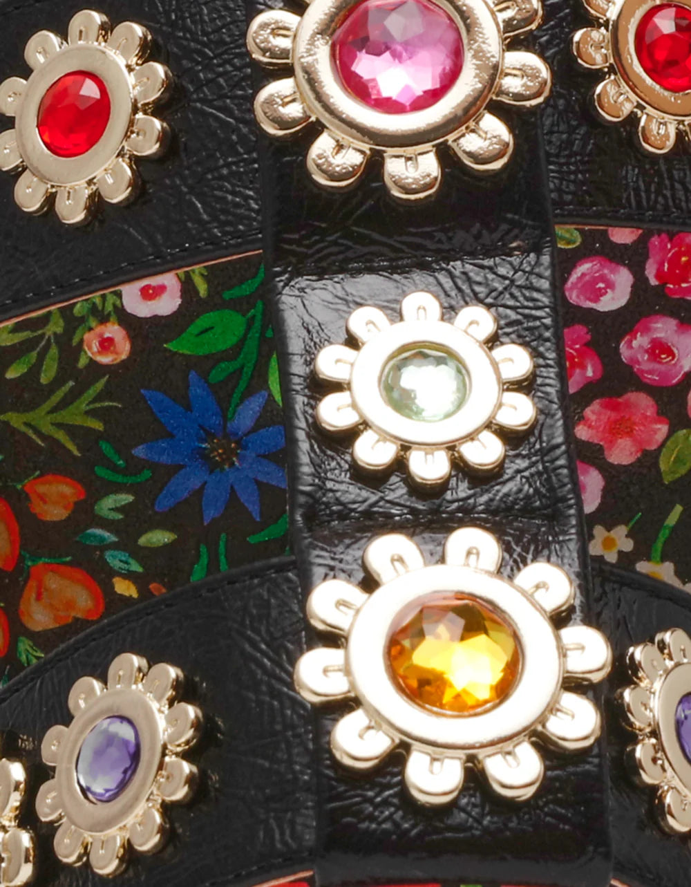 Floral sandal with colorful jewel embellishments and green heel detail view