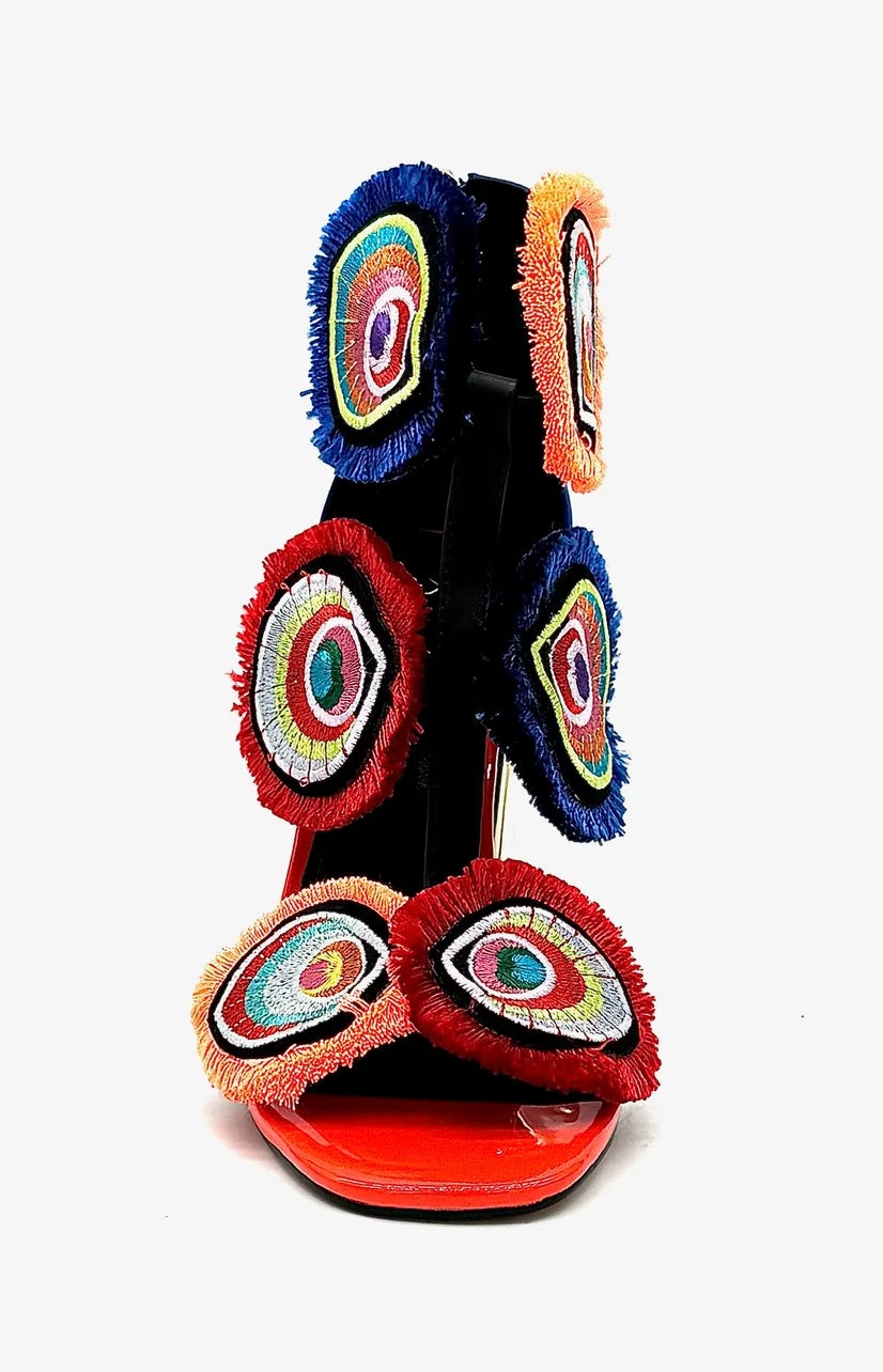 Colorful large heel with three peacock feather elements and zipper closure front view