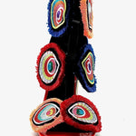 Colorful large heel with three peacock feather elements and zipper closure front view