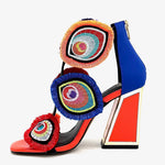 Colorful large heel with three peacock feather elements and zipper closure alternate side view