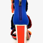 Colorful large heel with three peacock feather elements and zipper closure heel view
