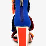 Colorful large heel with three peacock feather elements and zipper closure heel view