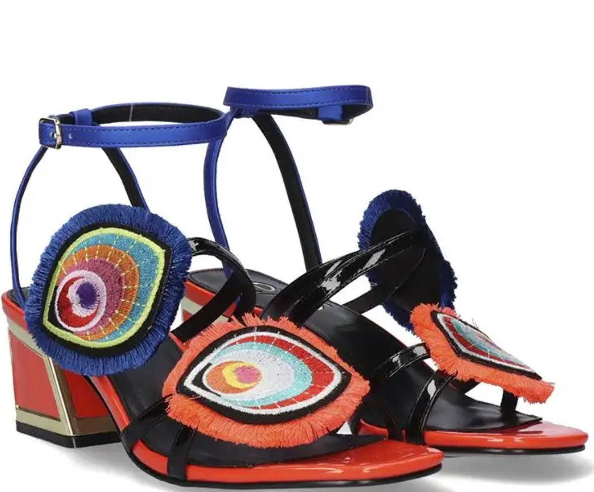 Colorful heel with peacock feather elements and blue strap buckle closure pair