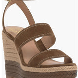 Brown wedge sandal with espadrille sole and buckle closure side view