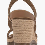 Brown wedge sandal with espadrille sole and buckle closure heel view