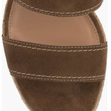 Brown wedge sandal with espadrille sole and buckle closure toe box
