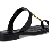 Black sandal with a gold chain with small heel rear view