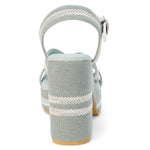 Blue heel with woven white straps heel view