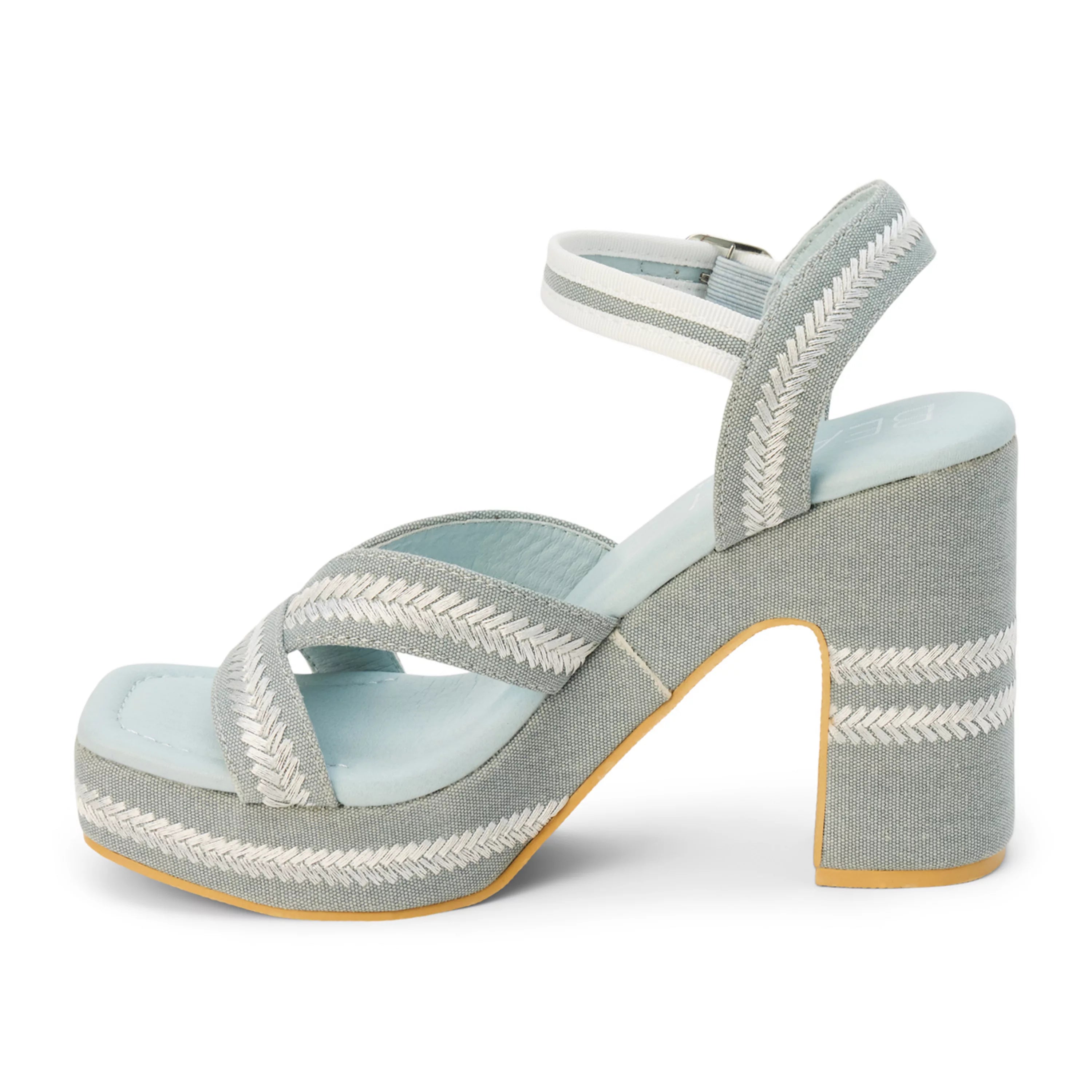 Blue heel with woven white straps inside view