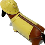 Dog-shaped bag with a yellow body and brown ears and tail back