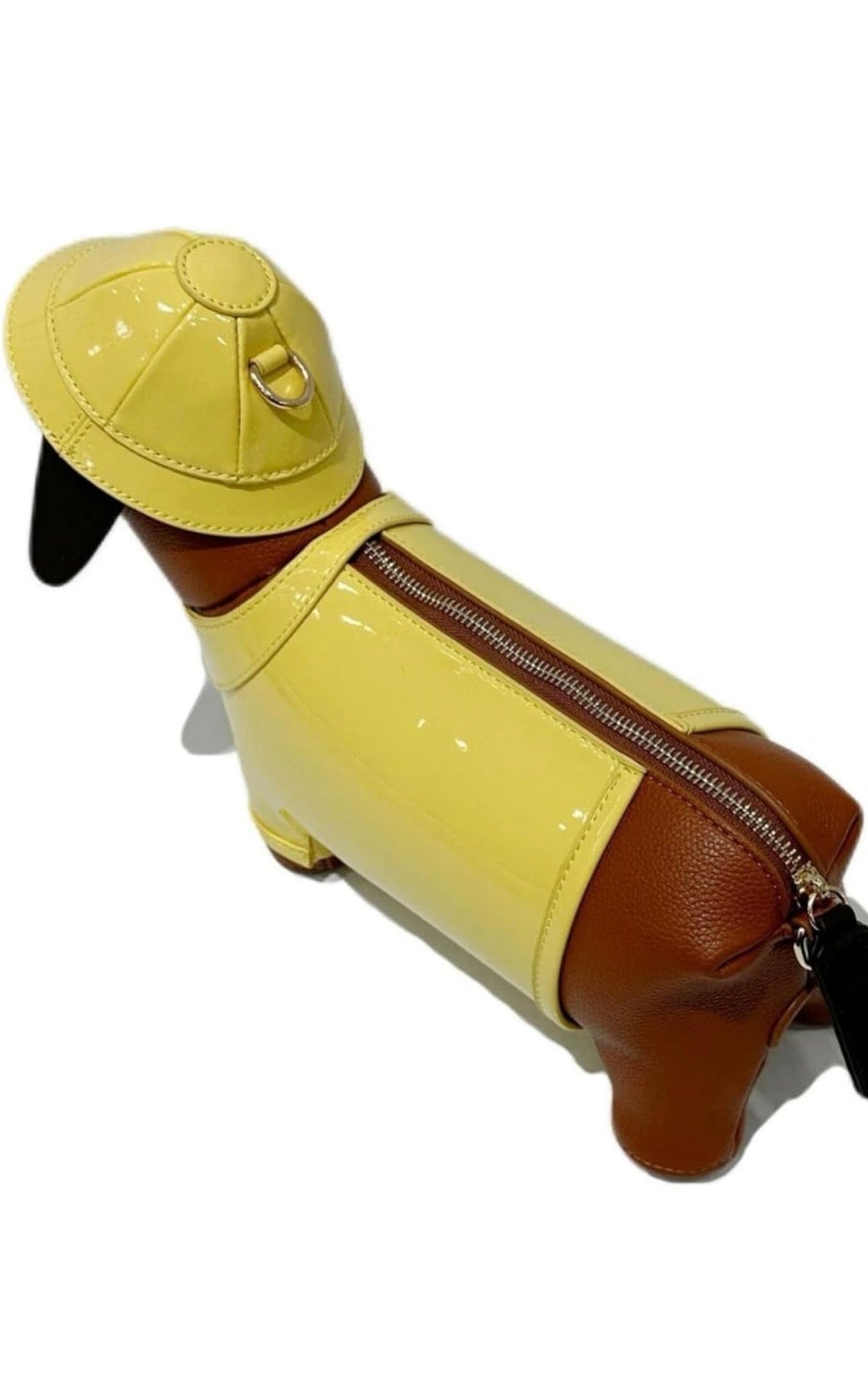 Dog-shaped bag with a yellow body and brown ears and tail back