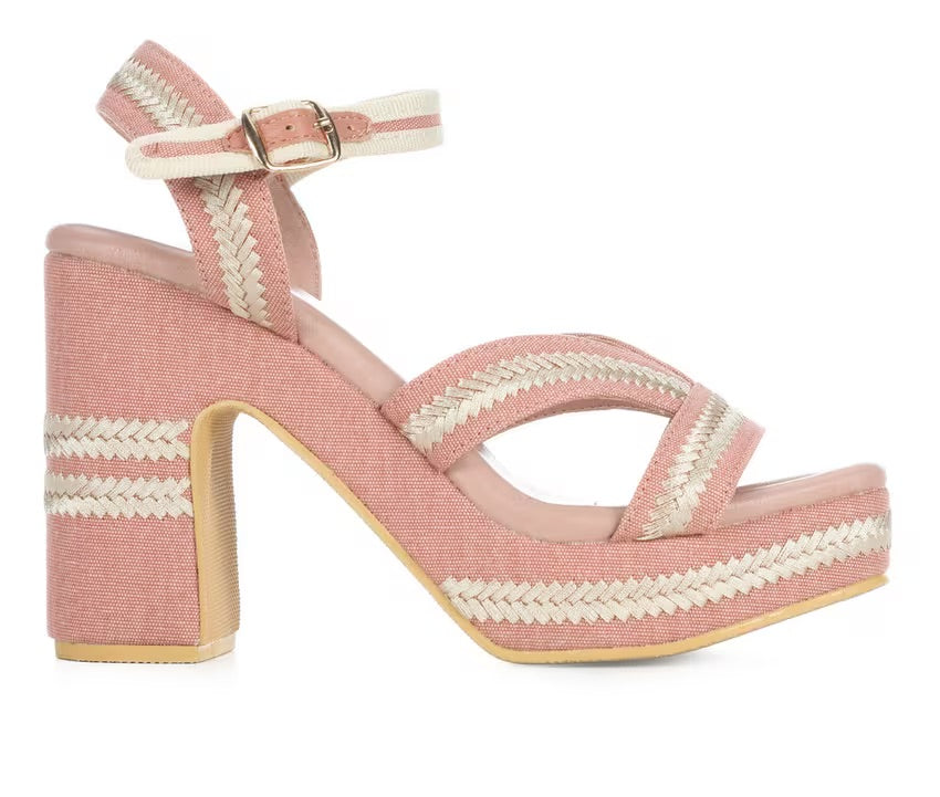 Pink heel with woven white straps close-up