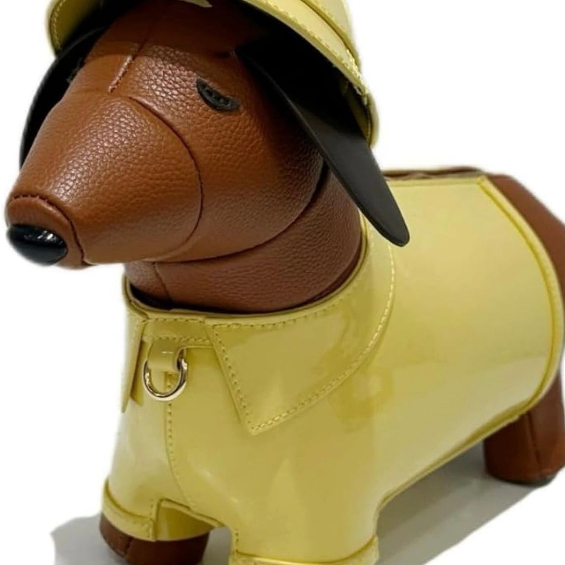 Dog-shaped bag with a yellow body and brown ears and tail alt view