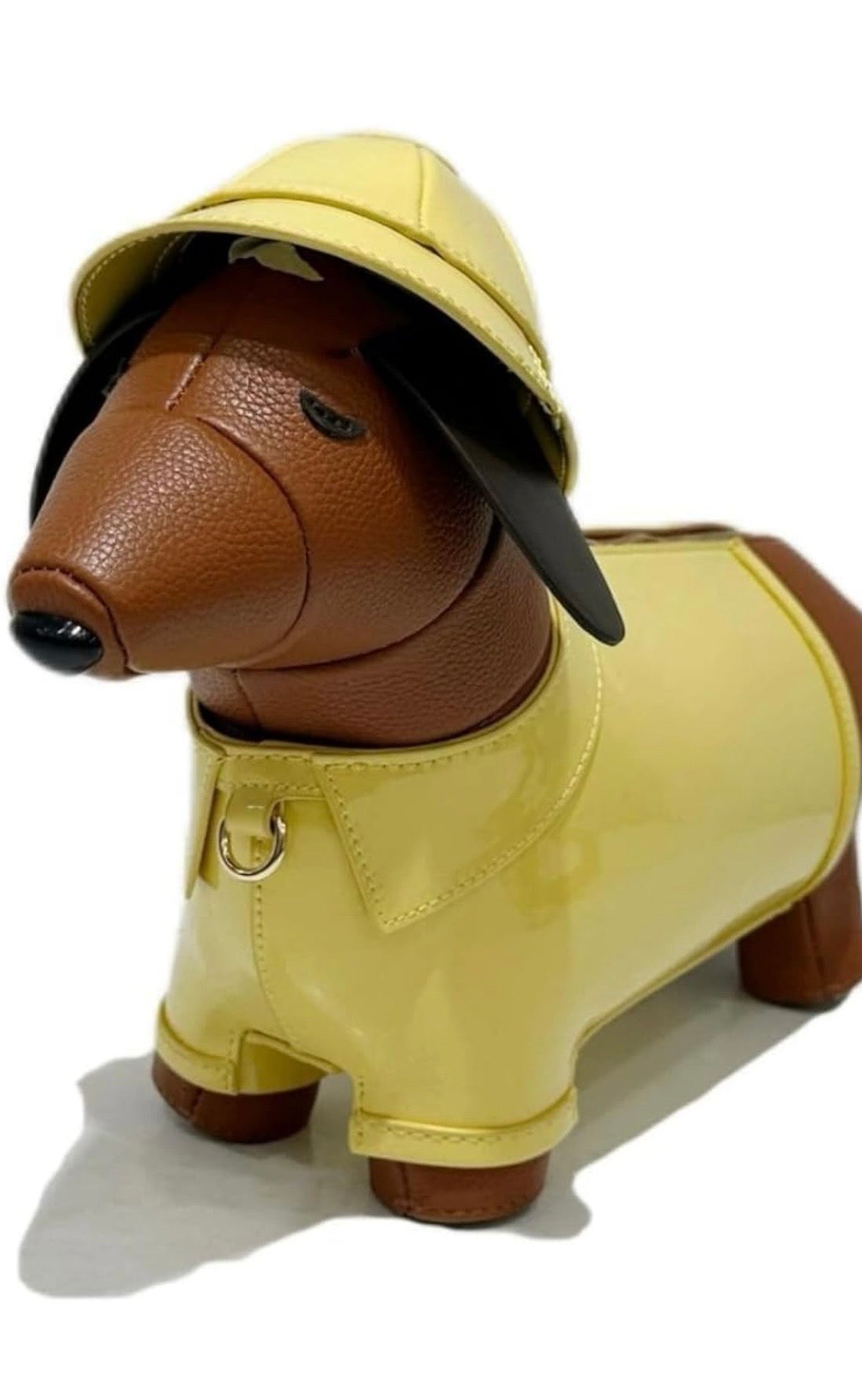 Dog-shaped bag with a yellow body and brown ears and tail alt view