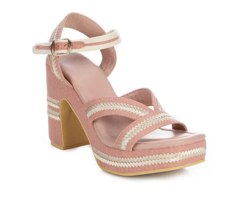 Pink heel with woven white straps front view