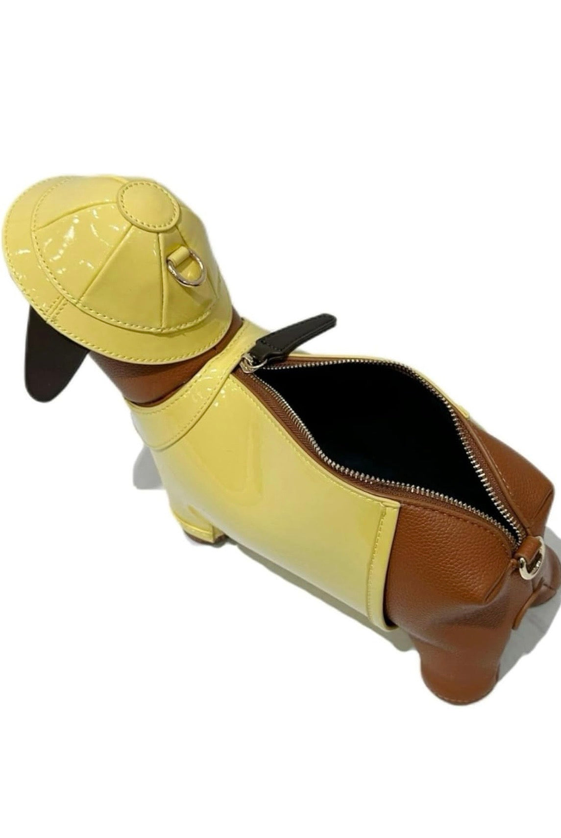 Dog-shaped bag with a yellow body and brown ears and tail back open