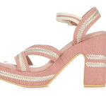 Pink heel with woven white straps inside view