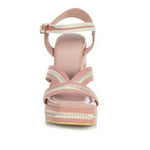 Pink heel with woven white straps toe box