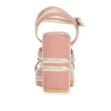 Pink heel with woven white straps heel view