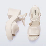 White platform heel with white strap and buckle closure top & side view