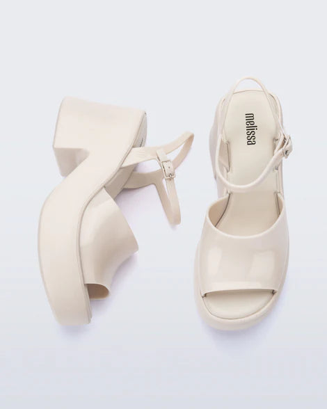 White platform heel with white strap and buckle closure top & side view