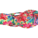 Colorful wedge sandal with a vibrant paint inspired floral pattern top view